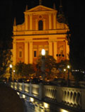 Triple Bridge and Franciscan Church at night